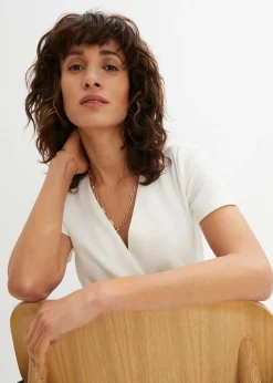 Combinaison avec boucle décorative