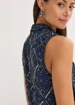 Combinaison brodée de perles