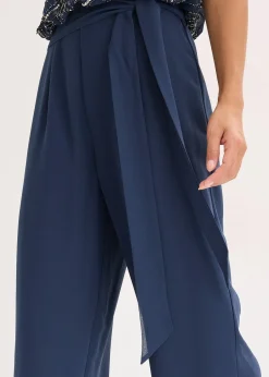 Combinaison brodée de perles