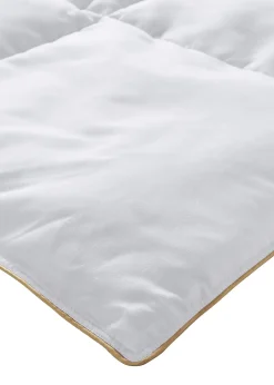 Couette légère toucher duvet