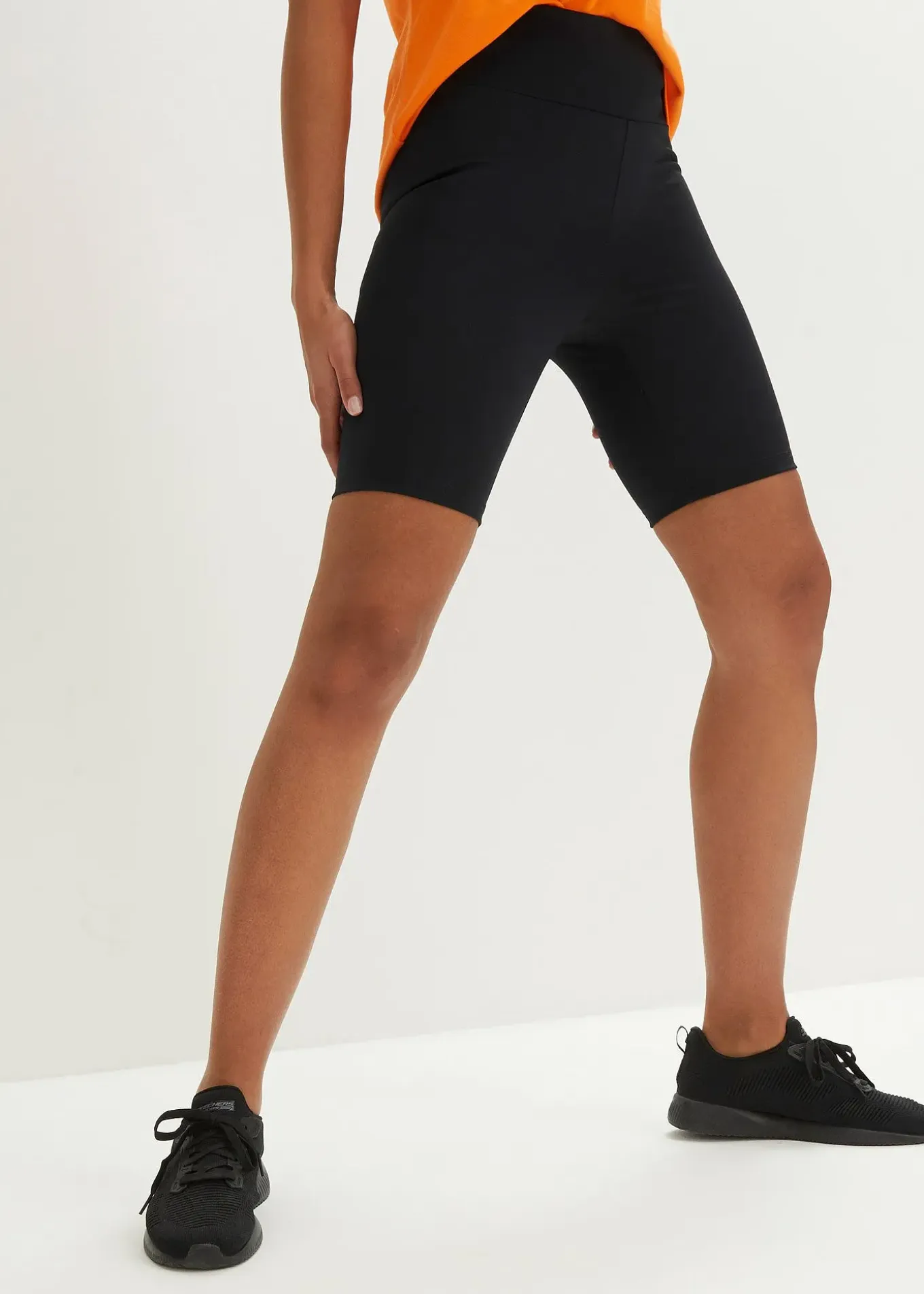 Cycliste fonctionnel avec poche dissimulée dans le dos, longueur bermuda