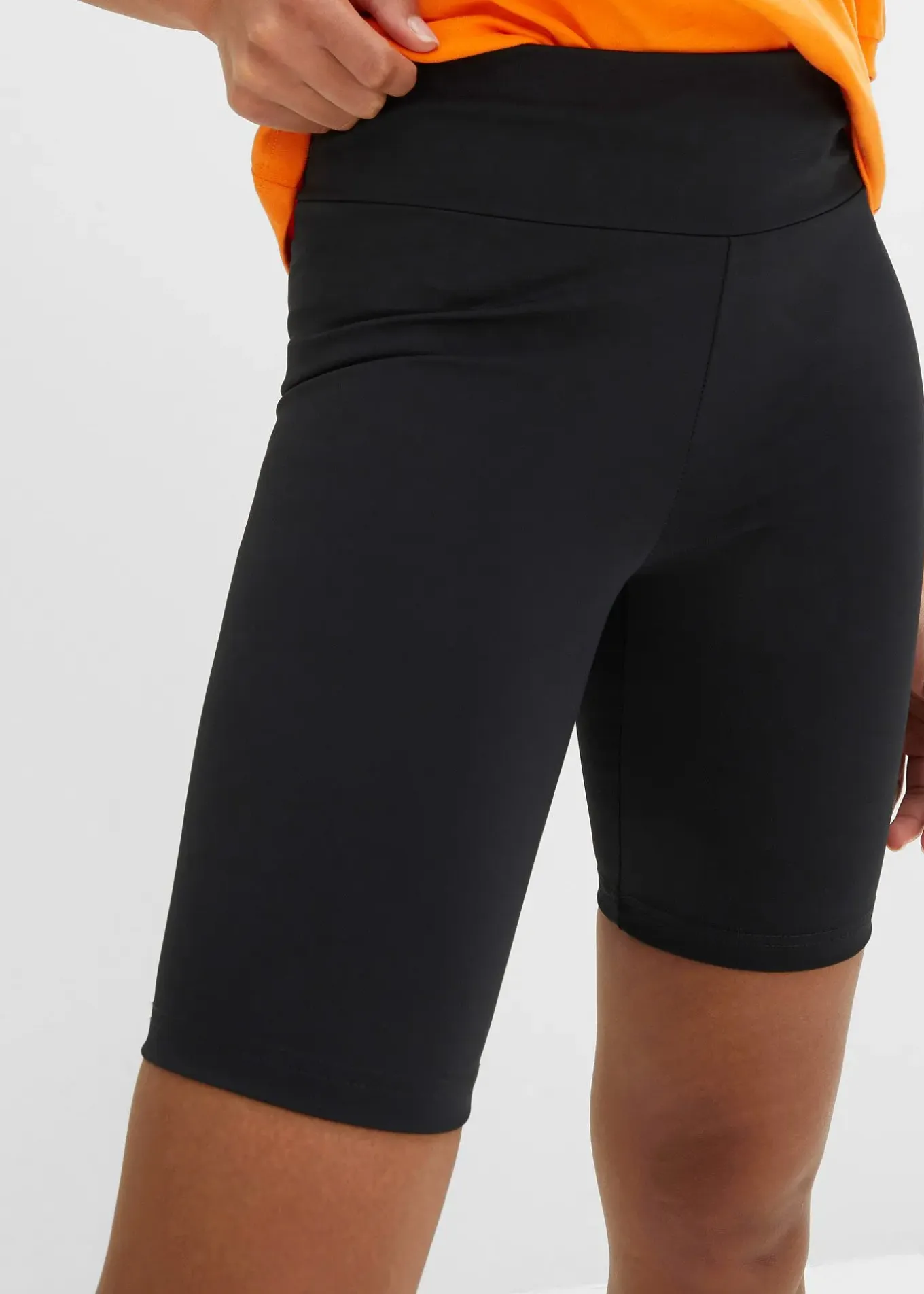 Cycliste fonctionnel avec poche dissimulée dans le dos, longueur bermuda