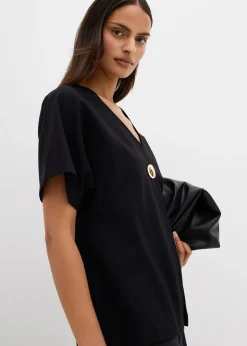 Gilet confortable en Punto di Roma avec bouton décoratif