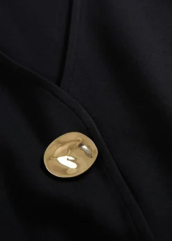 Gilet confortable en Punto di Roma avec bouton décoratif