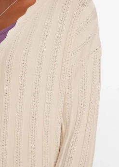 Gilet court en maille ajourée