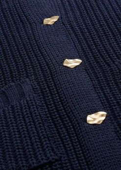 Gilet en grosse maille avec boutons martelés