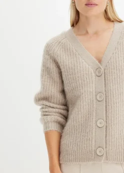 Gilet en grosse maille côtelée brillante