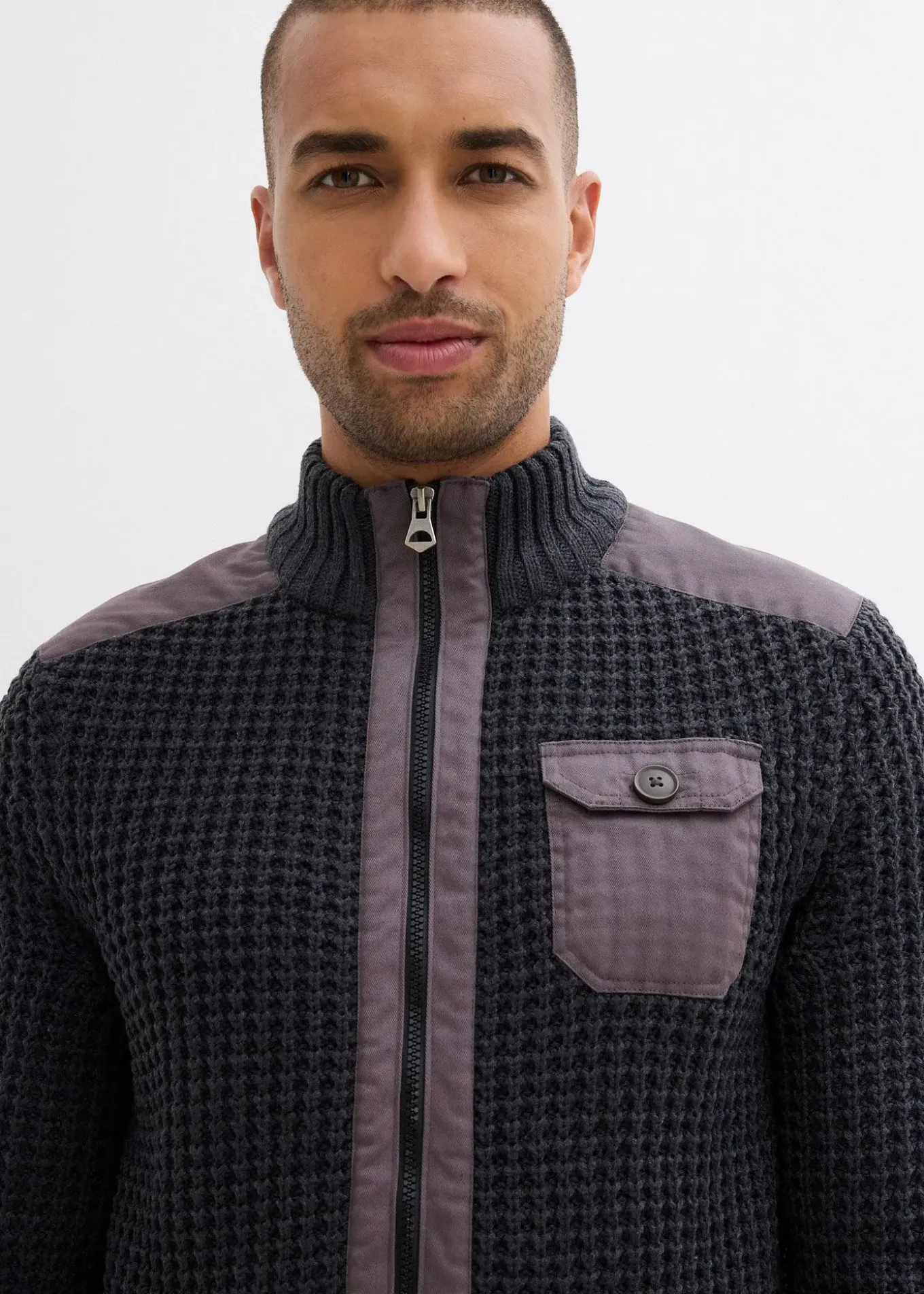 Gilet en grosse maille point de riz avec poche poitrine