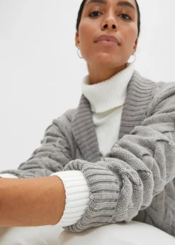 Gilet en maille à col châle et motif torsadé