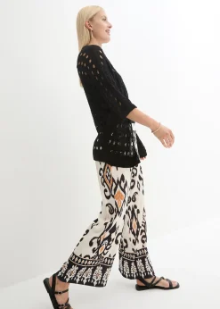 Gilet en maille ajourée avec fil brillant