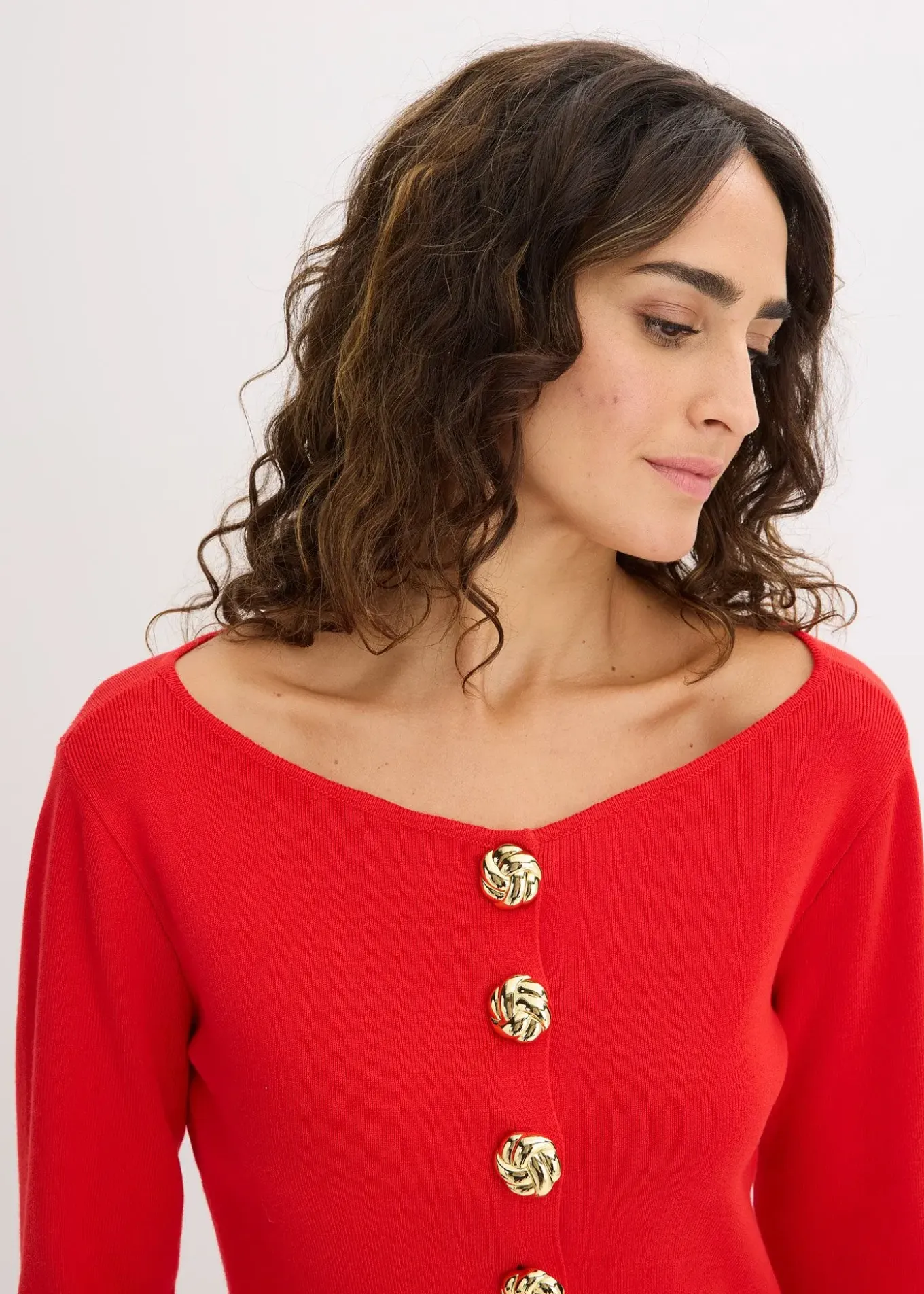 Gilet péplum en maille à boutons décoratifs