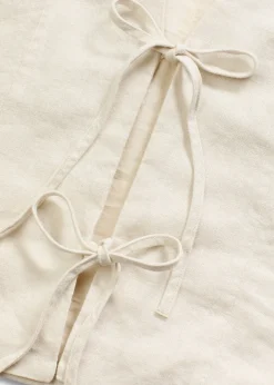 Gilet sans manches à nouettes