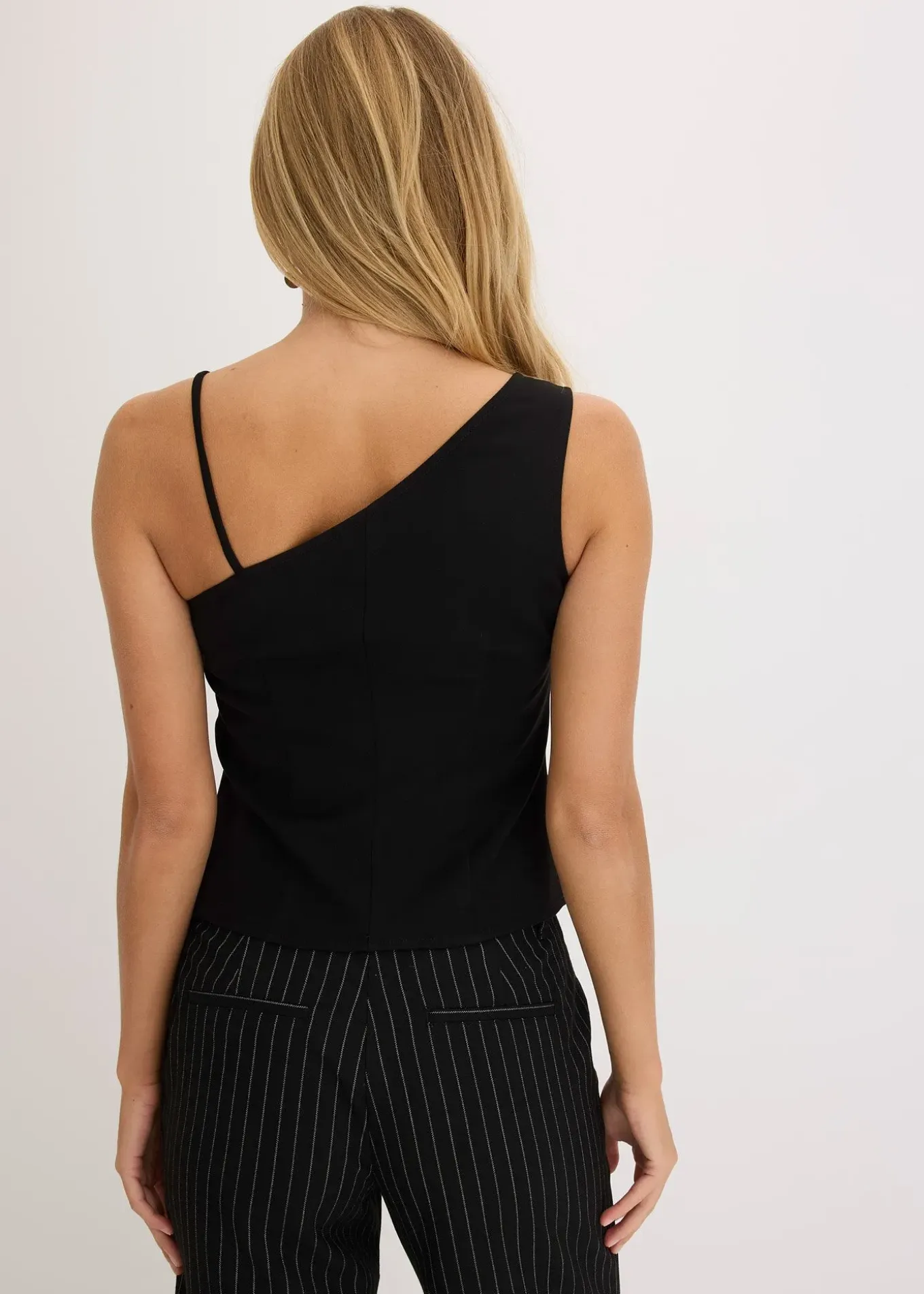 Gilet sans manches boutonné