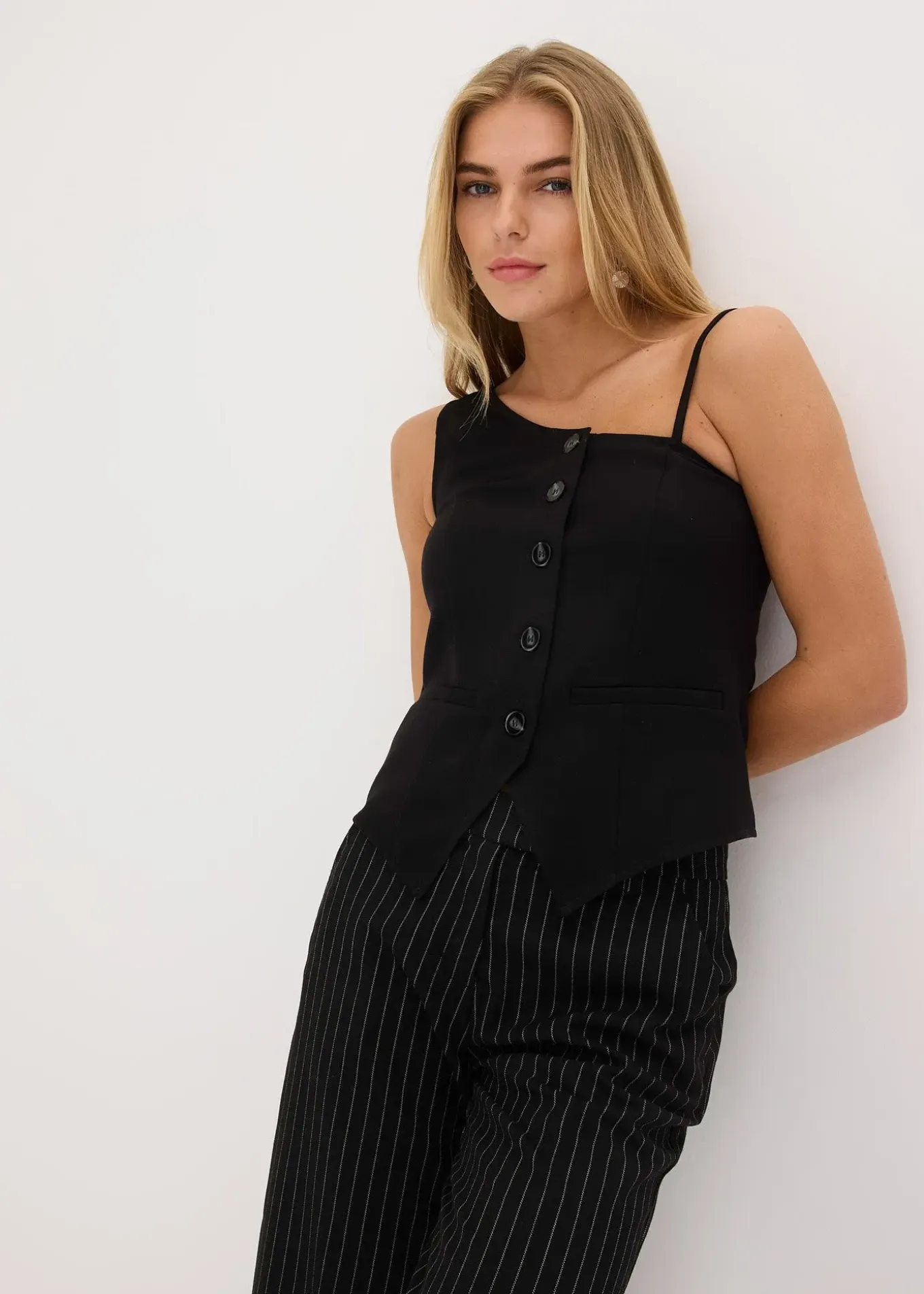 Gilet sans manches boutonné