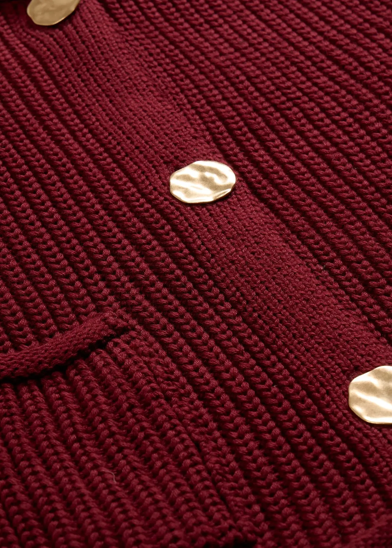 Gilet sans manches en maille avec des poches