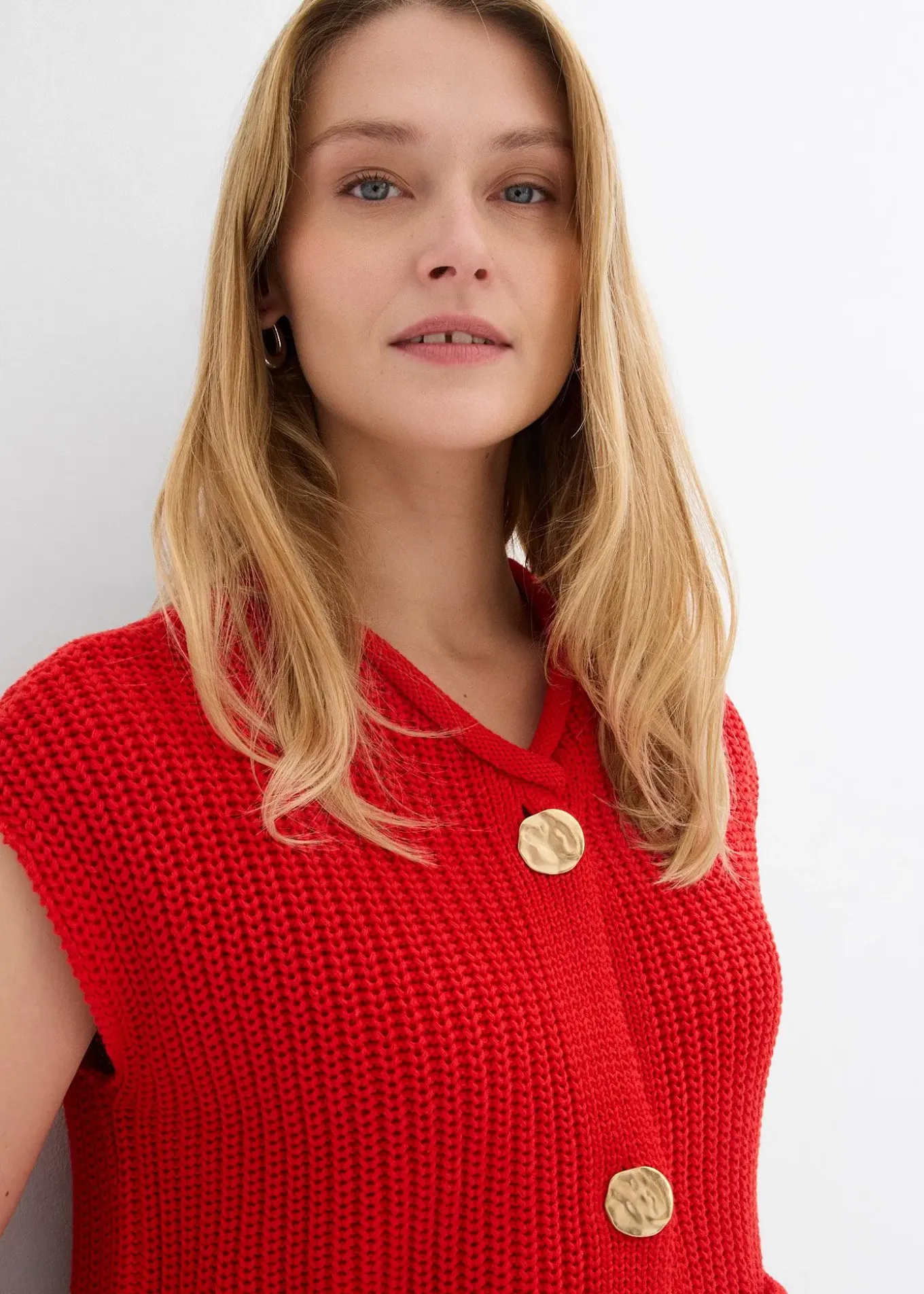 Gilet sans manches en maille avec des poches