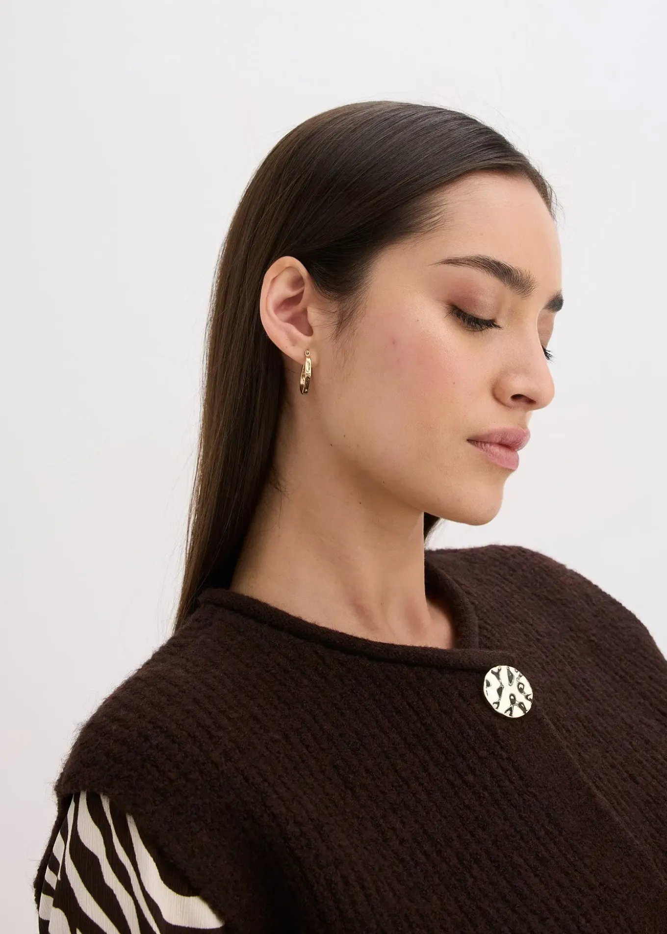 Gilet sans manches en maille à boutons décoratifs