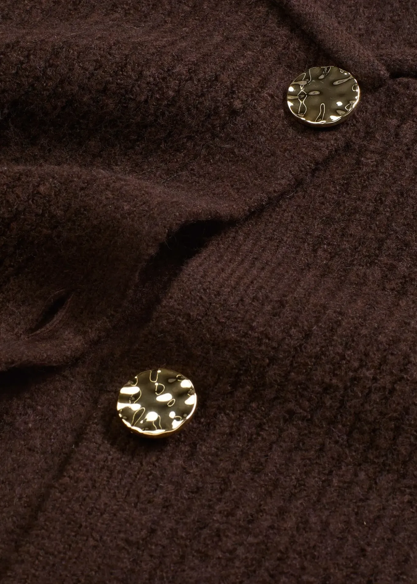 Gilet sans manches en maille à boutons décoratifs