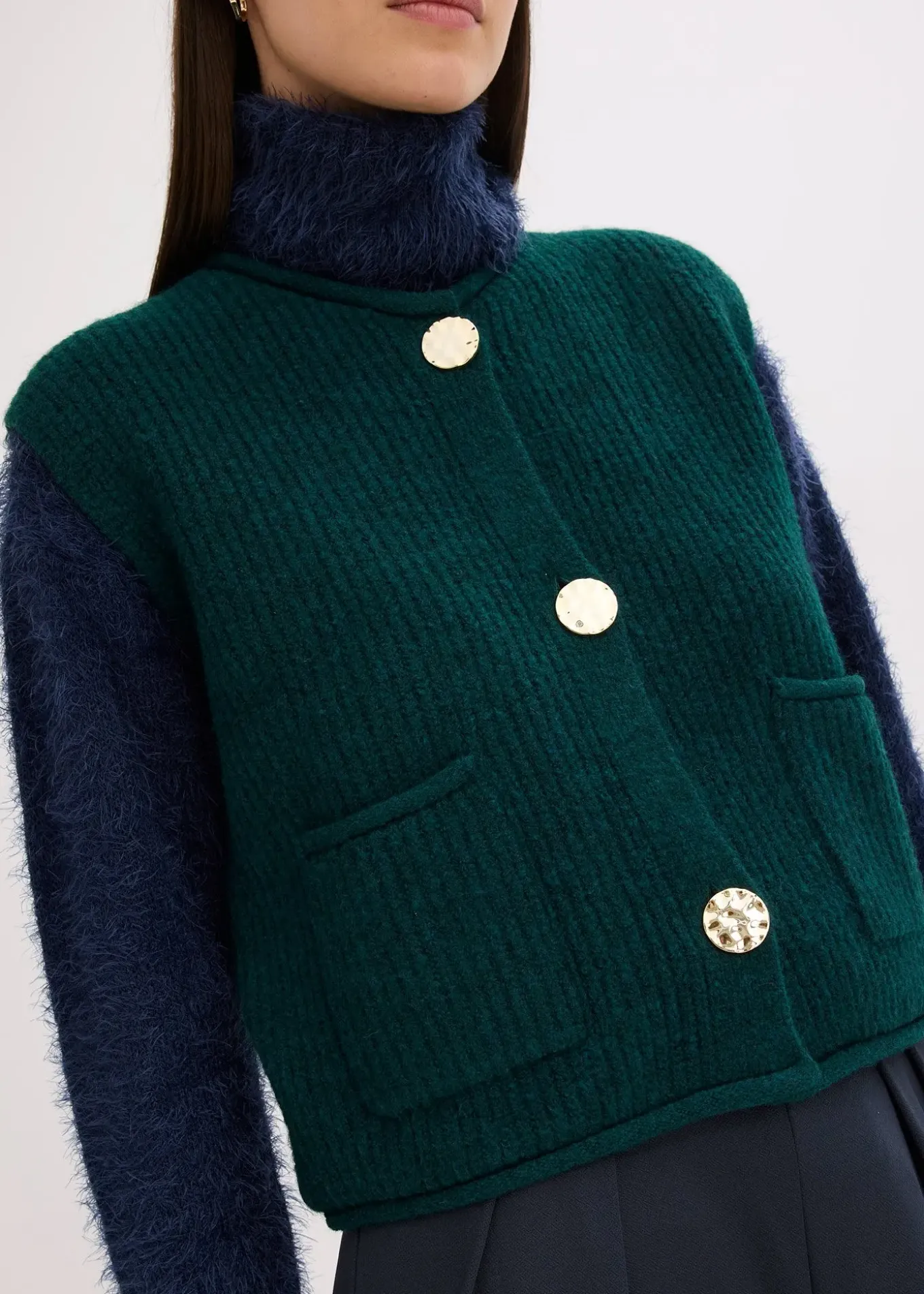 Gilet sans manches en maille à boutons décoratifs