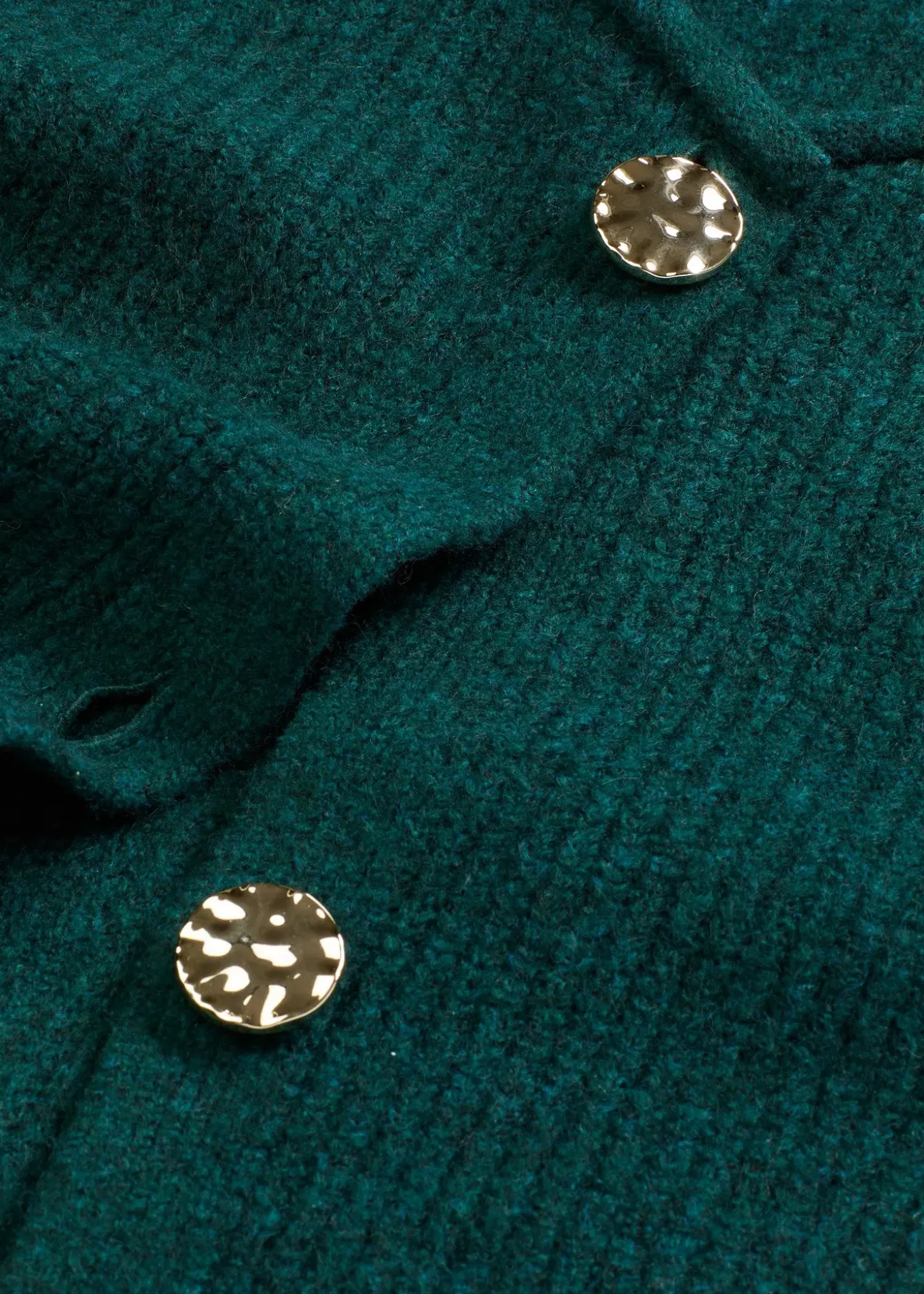 Gilet sans manches en maille à boutons décoratifs