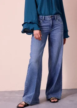 Jean large taille mi-haute, longueur sol, peu extensible