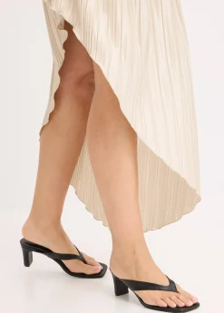 Jupe plissée en satin brillant