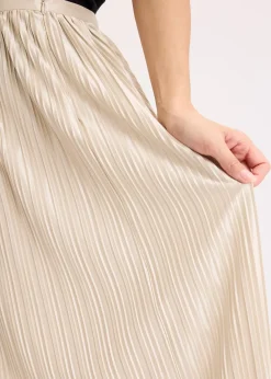 Jupe plissée en satin brillant