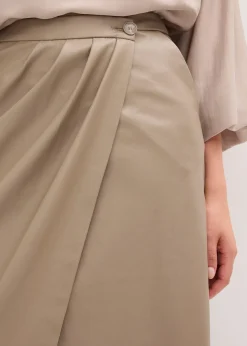 Jupe portefeuille enduite, longueur midi