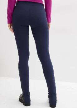 Legging avec fermeture zippée dans la couture