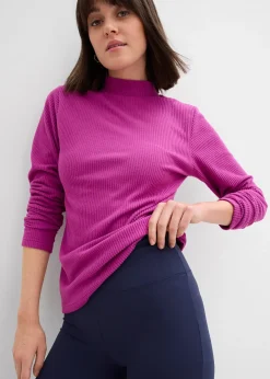 Legging avec fermeture zippée dans la couture