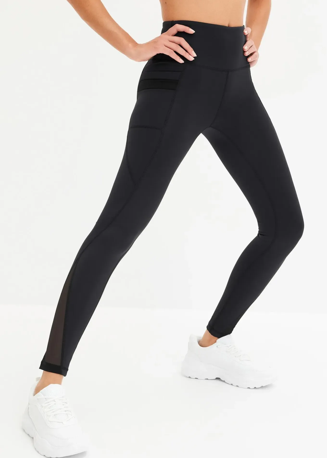 Legging de sport confortable avec mesh et poche pour portable