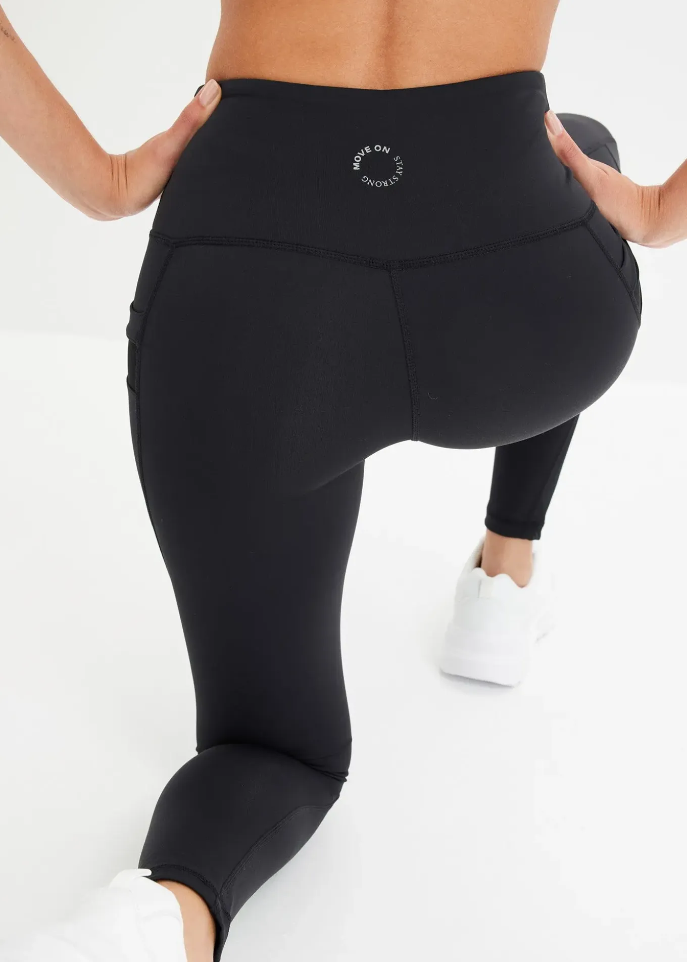 Legging de sport confortable avec mesh et poche pour portable