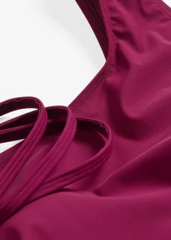 Maillot sculptant une épaule, maintien léger