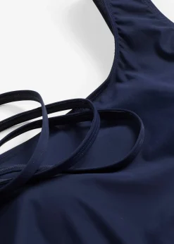 Maillot sculptant une épaule, maintien léger