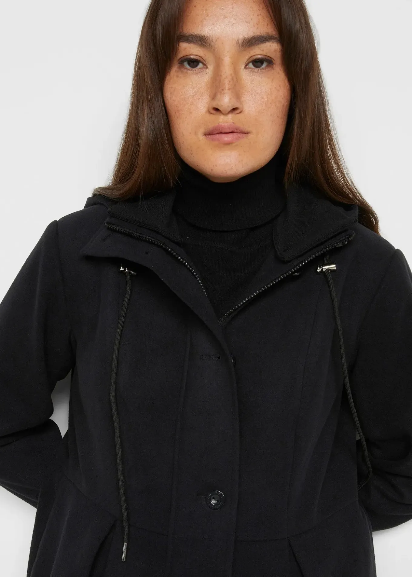 Manteau à capuche et pinces