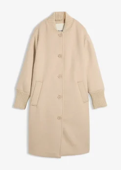 Manteau à empiècement en maille