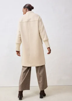 Manteau à empiècement en maille