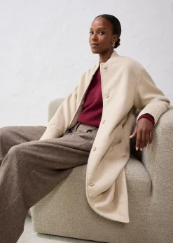 Manteau à empiècement en maille