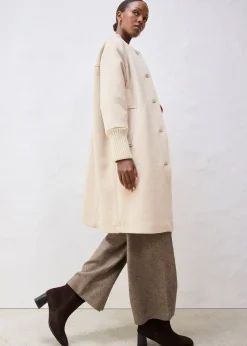 Manteau à empiècement en maille