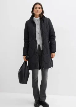 Manteau court avec surpiqûres diamant et zips latéraux
