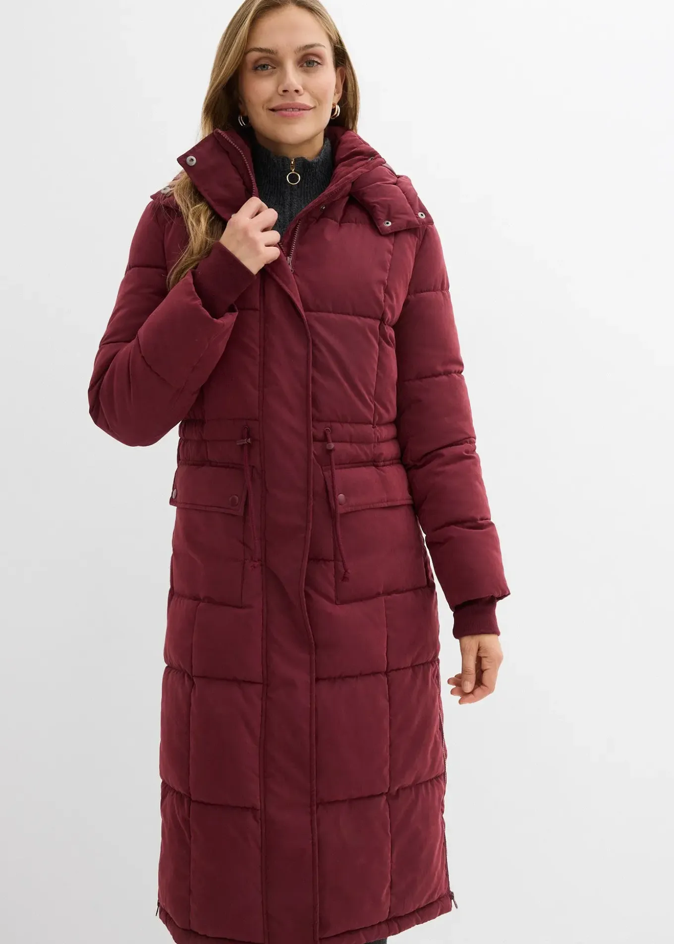 Manteau d’hiver avec fermetures zippées sur les côtés