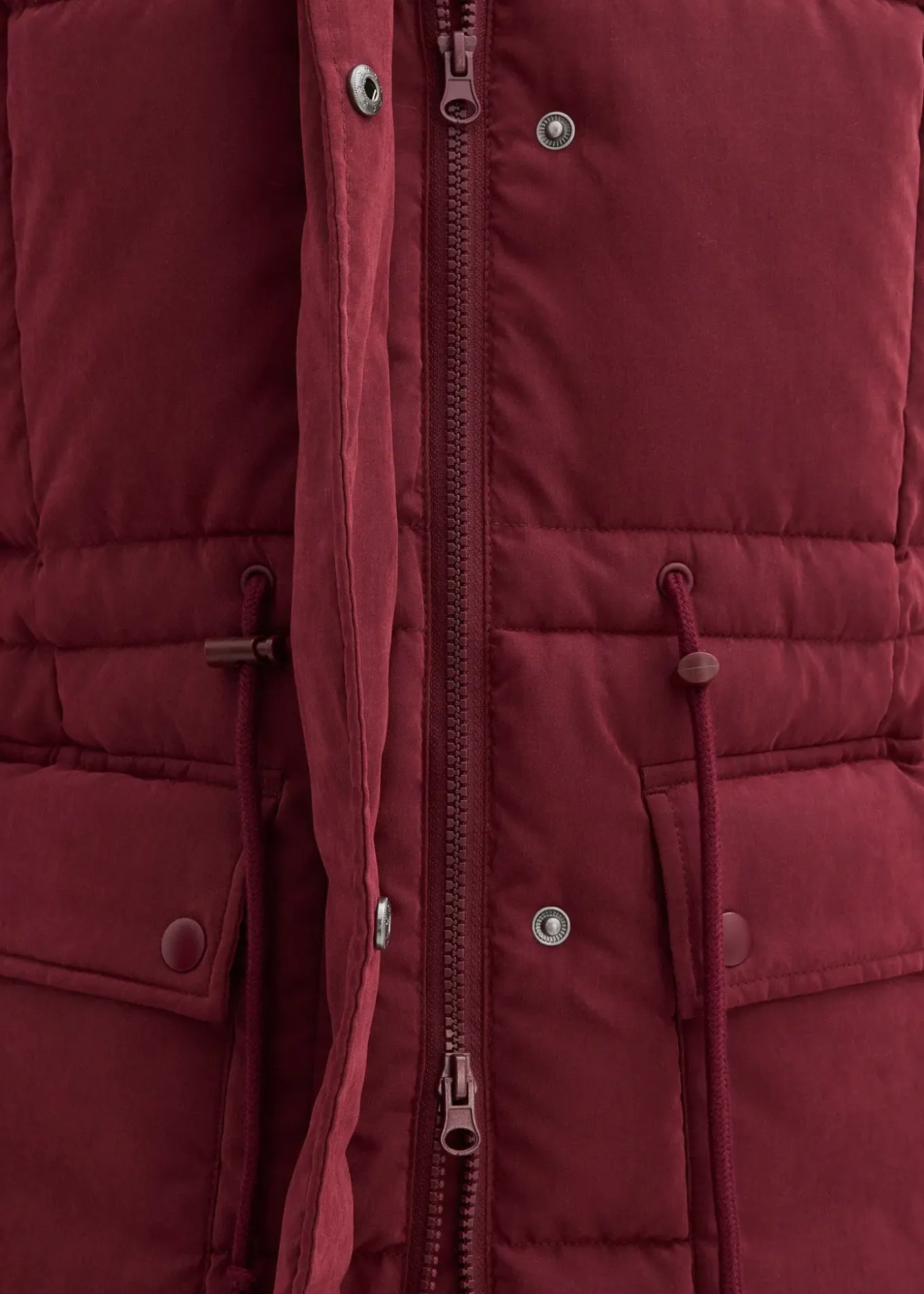 Manteau d’hiver avec fermetures zippées sur les côtés