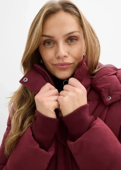 Manteau d’hiver avec fermetures zippées sur les côtés