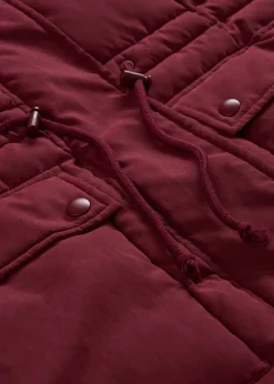 Manteau d’hiver avec fermetures zippées sur les côtés