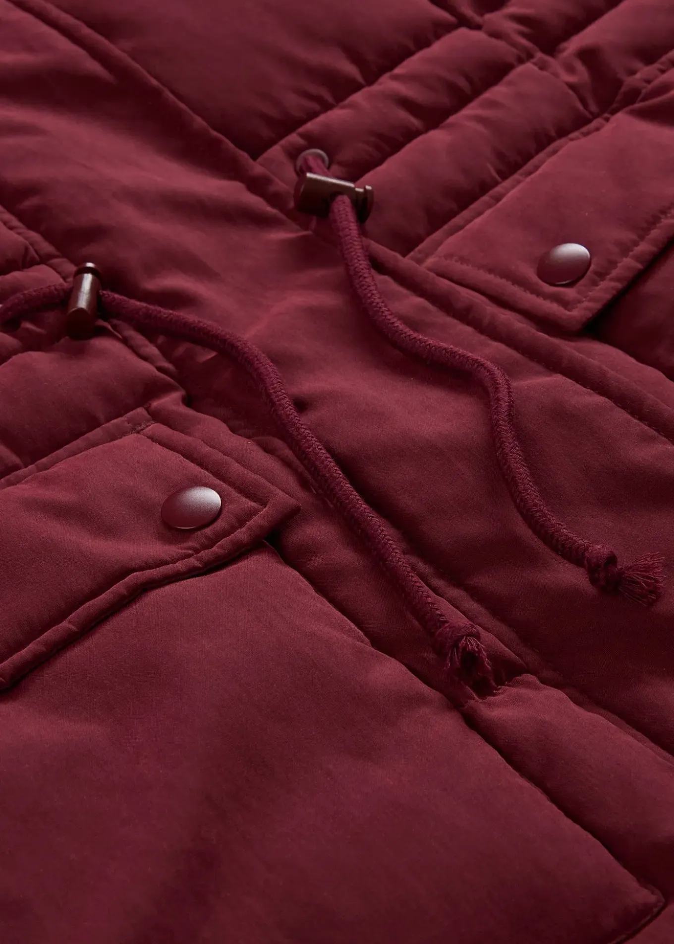 Manteau d’hiver avec fermetures zippées sur les côtés