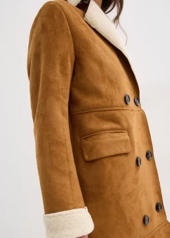 Manteau effet peau retournée avec doublure sherpa