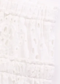 Mini-jupe en broderie anglaise