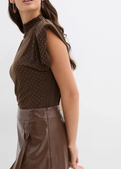 Mini-jupe enduite à plis creux