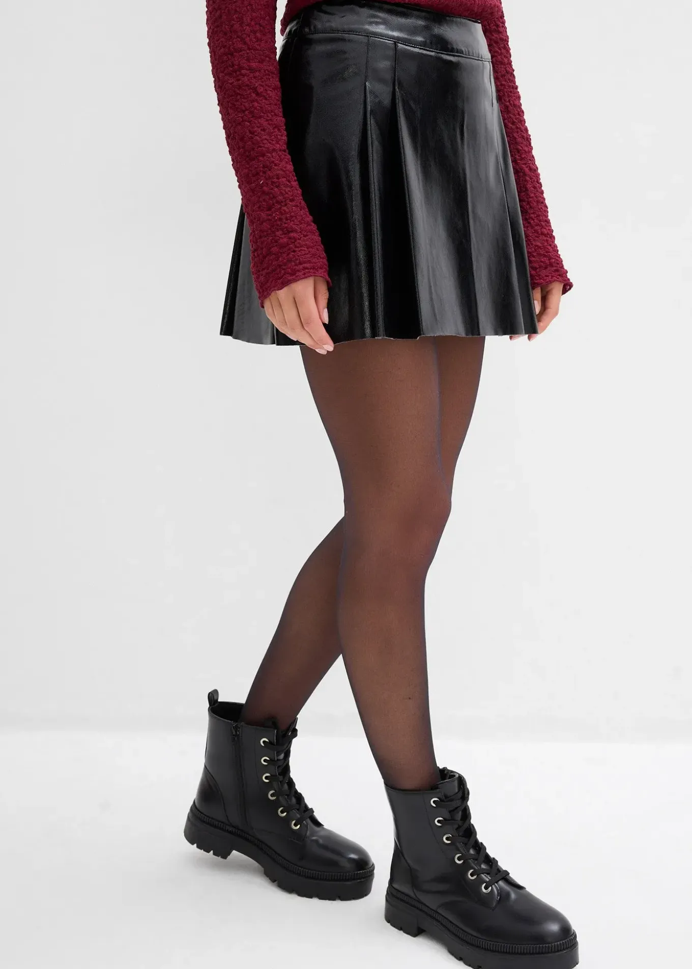 Mini-jupe enduite à plis creux