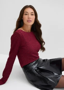 Mini-jupe enduite à plis creux